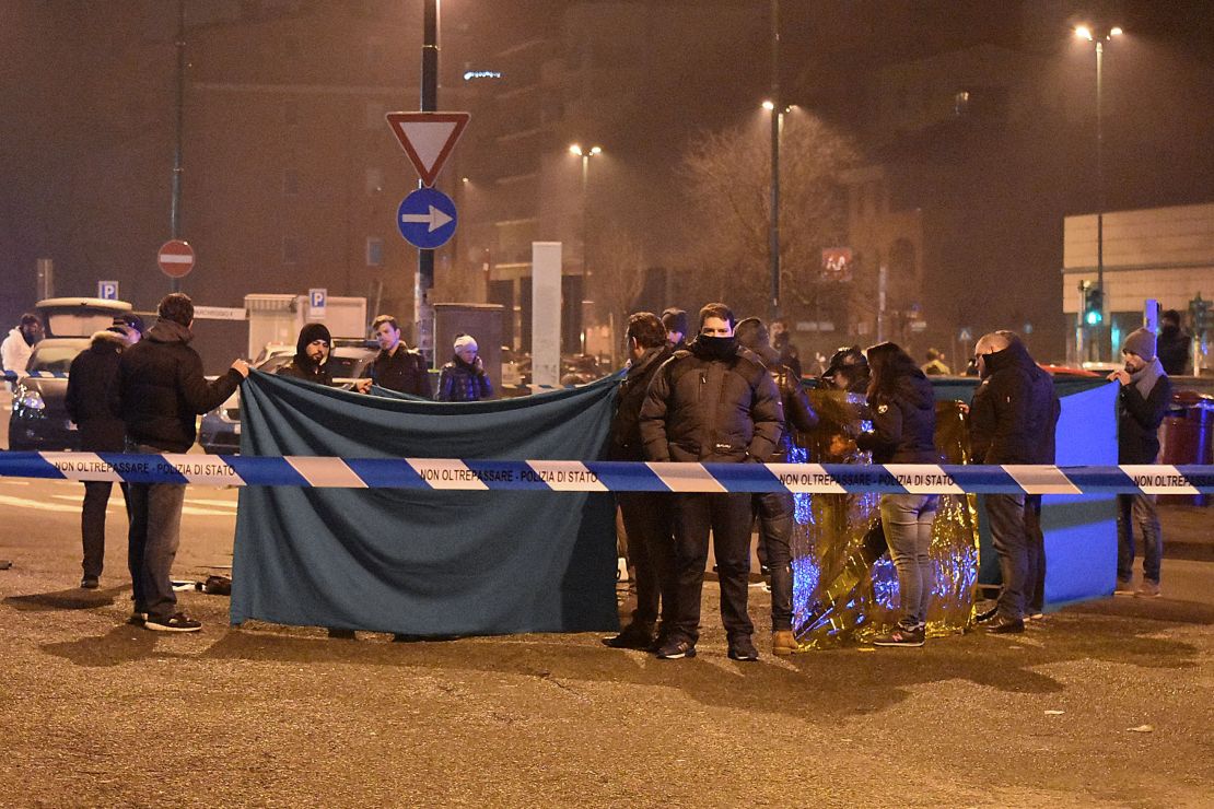 Italian authorities cordon off the area Friday where Amri was shot.