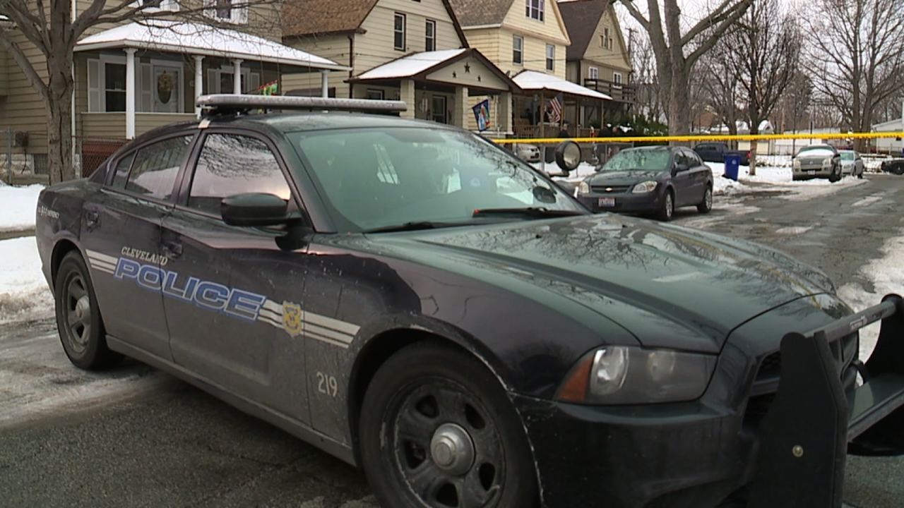 Police investigate the fatal shooting of a 2-year-old boy in Cleveland on December 23, 2016.