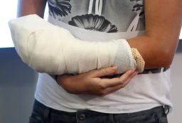 Kvitova holds her bandaged hand after addressing media in Prague.