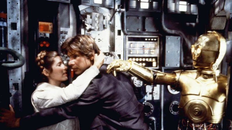 Harrison Ford and Fisher embrace during filming of "Star Wars: Episode V - The Empire Strikes Back" in 1980. On November 16, 2016, Fisher <a href="index.php?page=&url=http%3A%2F%2Fwww.cnn.com%2F2016%2F11%2F16%2Fentertainment%2Fcarrie-fisher-harrison-ford%2Findex.html" target="_blank">revealed to People magazine that she and co-star Ford had an affair</a> during the 1976 filming of "Star Wars."