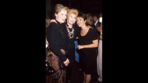Meryl Streep, left -- who portrayed a character based on Fisher in the film adaptation of Fisher's 1987 novel, "Postcards from the Edge" -- is seen at the film's premiere in Century City, California, on September 10, 1990.