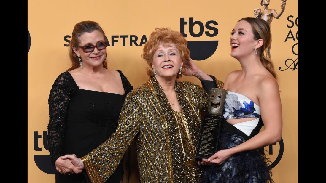 Fisher  poses with her mother Debbie Reynolds and daughter Billie Catherine Lourd at the 21st Annual Screen Actors Guild Awards in Los Angeles on January 25, 2015.