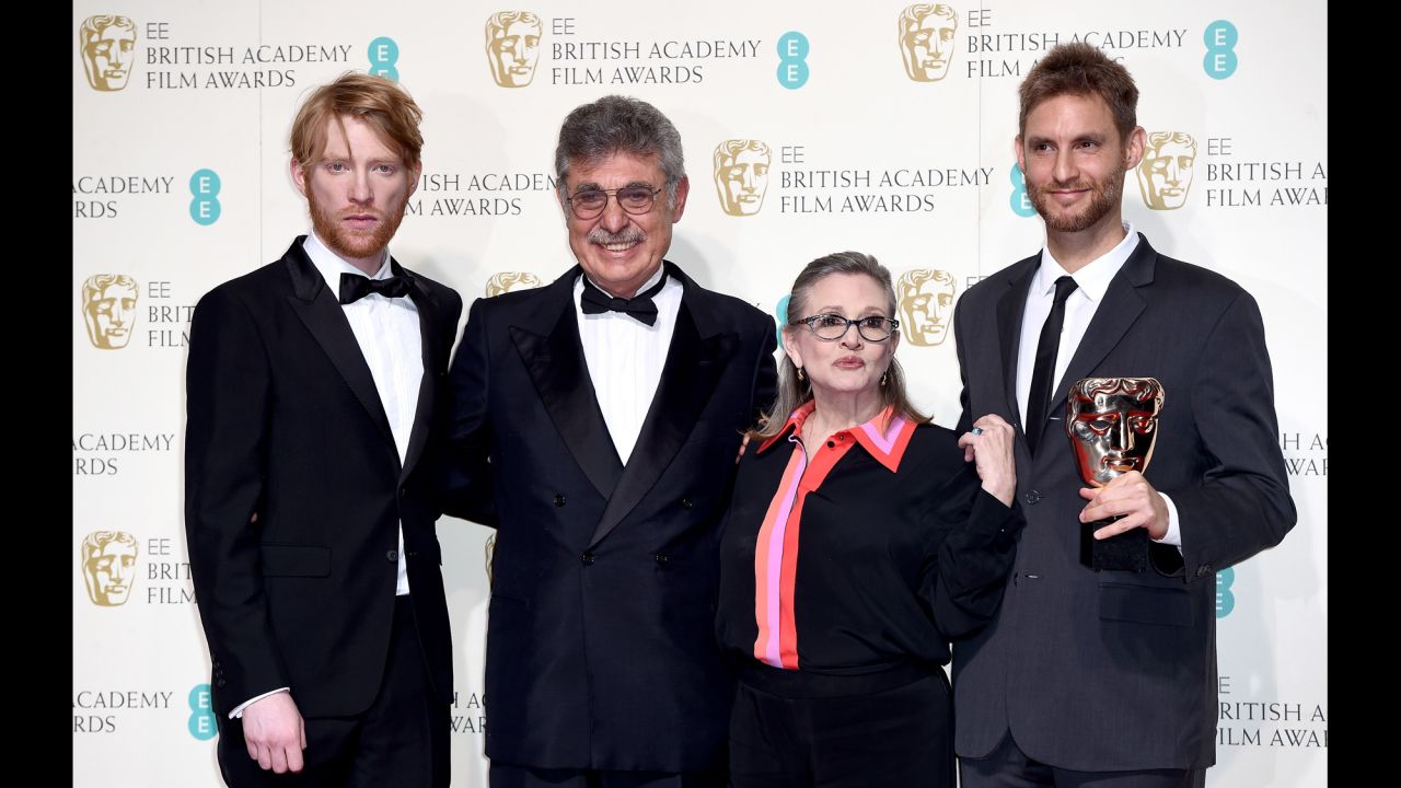 Domhnall Gleeson, left, Hugo Sigman, Fisher, and Damian Szifron pose for a photo at the EE British Academy Film Awards in London on February 14, 2016. Their film, "Wild Tales," won the BAFTA Award for best film not in the English language.