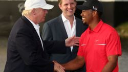 Donald Trump and Tiger Woods share a moment after the golfer claimed a 2013 win in a tournament on the tycoon's Doral course in Florida.