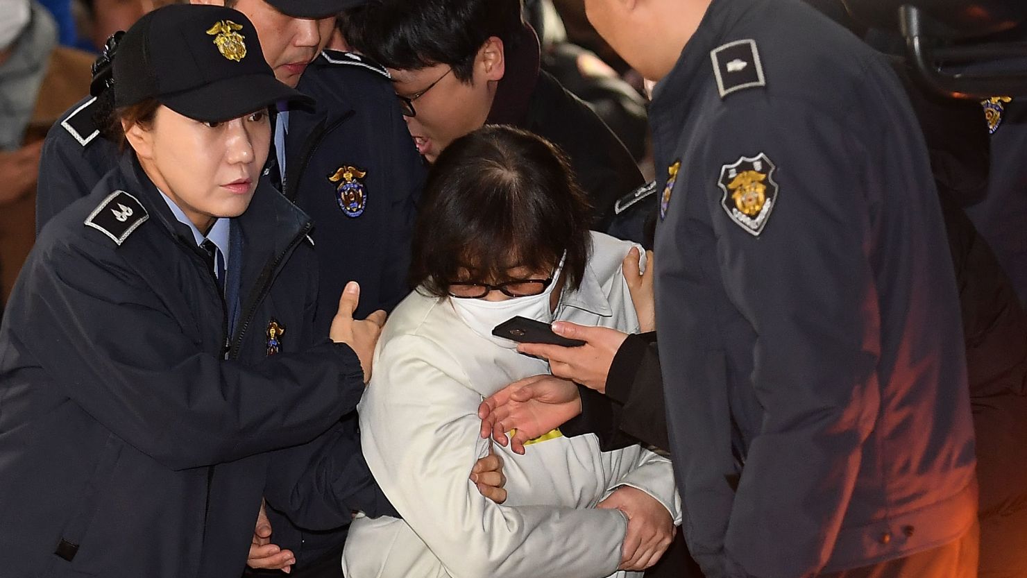 Choi Soon-Sil arrives for questioning on December 24, 2016 in Seoul, South Korea.