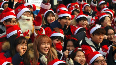 South Koreans don holiday attire at Saturday's rally in the ninth straight weekend of protests.