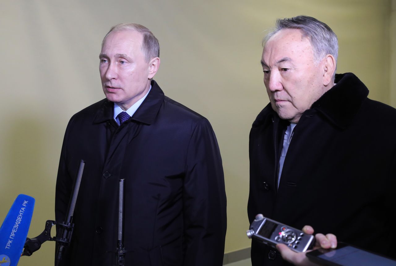 Russian President Vladimir Putin, left, and Nursultan Nazarbayev, president of Kazakhstan, speak to members of the media in St. Petersburg, Russia, on December 25. Putin has ordered Prime Minister Dmitry Medvedev to lead an investigation of the crash, Russian news agency Sputnik reported.