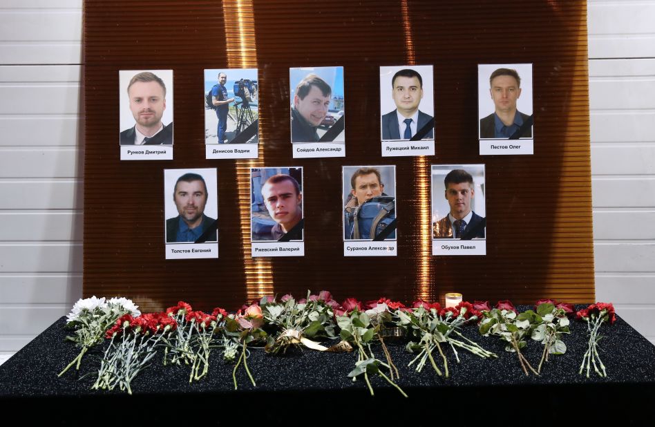Photographs of Channel One, NTV and Zvezda TV journalists killed in the plane crash are seen outside the Ostankino Technical Center in Moscow.