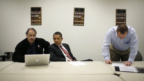 Obama huddles with his campaign staff, including Robert Gibbs, right, before a town-hall meeting in Erie, Pennsylvania, in April 2008. Gibbs would later be Obama's press secretary.