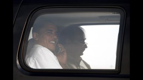 Obama and Axelrod sit on an airport tarmac in Washington in June 2008.
