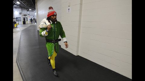 DeAngelo Williams of the Pittsburgh Steelers arrives at Heinz Field in Pittsburgh dressed as an elf before the game between the Steelers and the Baltimore Ravens on December 25.