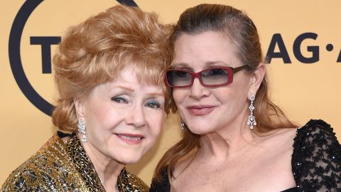 Debbie Reynolds and Carrie Fisher at the 21st Annual Screen Actors Guild Awards on January 25, 2015.  (Photo by Ethan Miller/Getty Images)