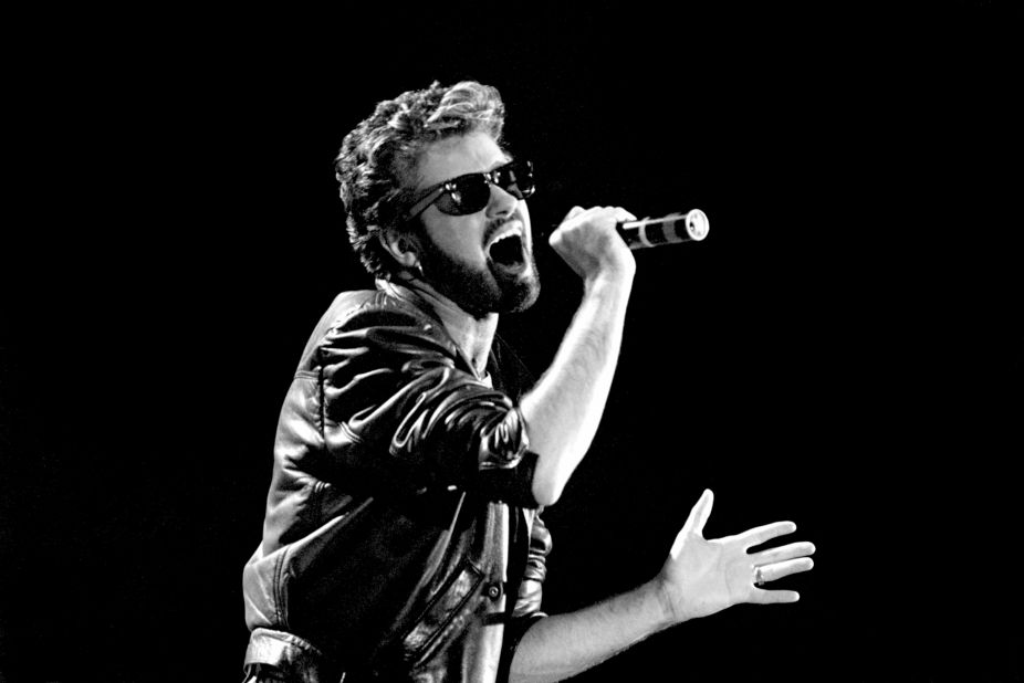 George Michael of Wham! performs at the Live Aid concert in London in 1985.