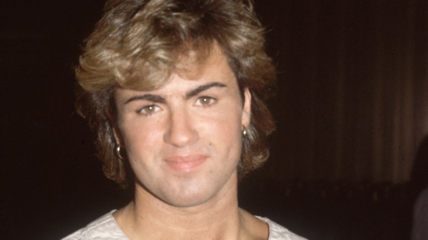 1984:  English pop star and one half of the duo 'Wham', George Michael, arriving at Heathrow Airport.  (Photo by Hulton Archive/Getty Images)