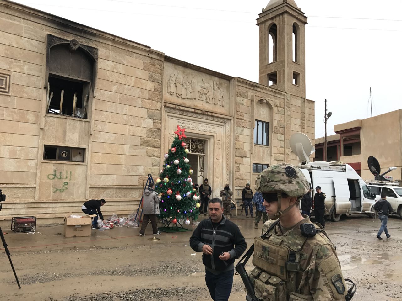 US and Iraqi security forces were on hand to protect churchgoers after ISIS reportedly made threats to attack Bartella.