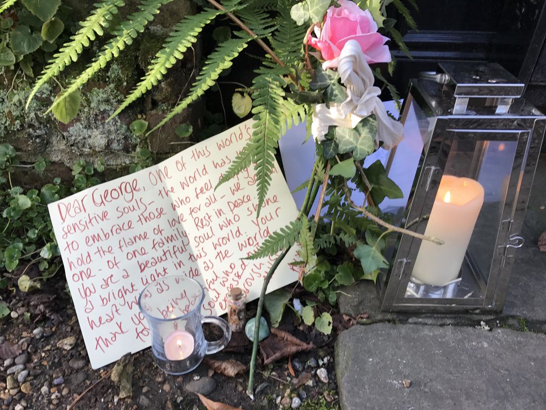 Flowers and letters have ben left by those visiting Michael's home.