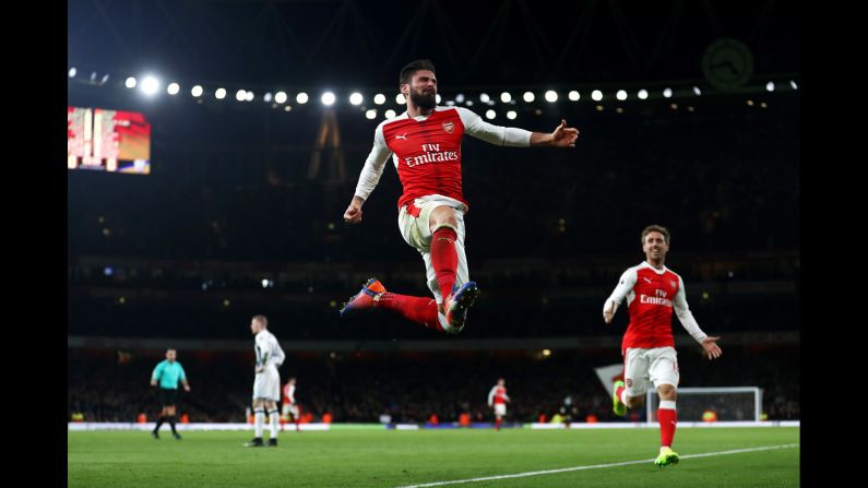 Arsenal's Olivier Giroud celebrates after scoring against West Brom during a Premier League match in London on Monday. Giroud's late goal secured his team's 1-0 win over West Brom. 