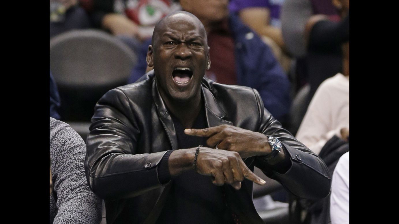 Charlotte Hornets owner Michael Jordan yells at an official during an NBA game against Chicago in Charlotte, North Carolina, on Friday. Jordan's team defeated Chicago 103-91.