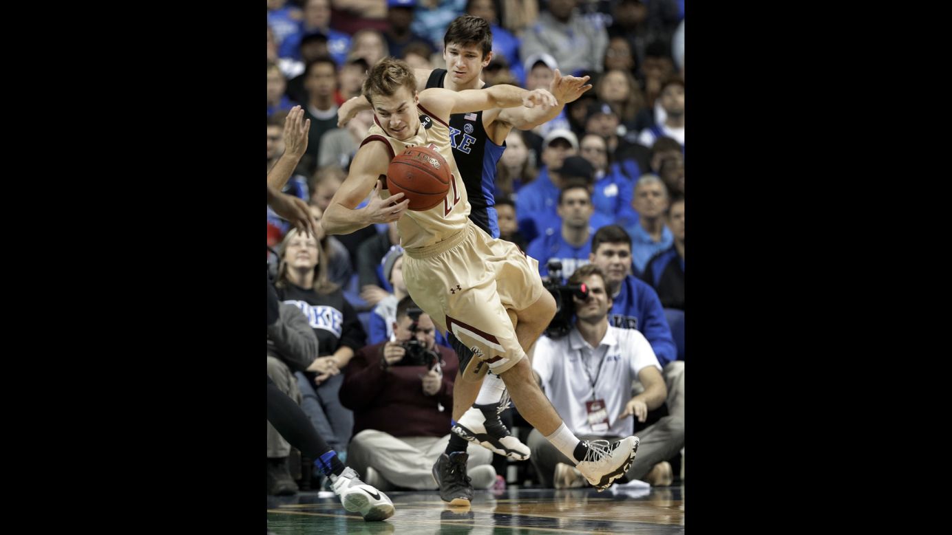 Duke's Grayson Allen trips Elon's Steven Santa Ana during an NCAA basketball game in Greensboro, North Carolina on Wednesday. Allen was called for a technical foul and sent to the bench after the play. This game marked the third time Allen has tripped an opponent since last February, and Duke has suspended him indefinitely.