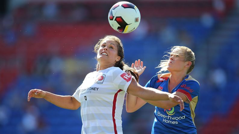 Western Sydney's Erica Halloway, left, and Cassidy Davis of Newcastle go for the ball during a W-League match in Newcastle, Australia, on Monday. Western Sydney won 2-1.