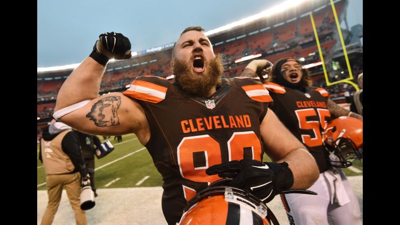 Cleveland defensive end Jamie Meder, front, and nose tackle Danny Shelton celebrate after their team beat San Diego 20-17 in an NFL game in Cleveland on Saturday.