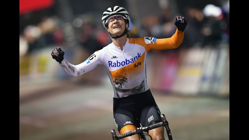 Dutch bicycler Marianne Vos celebrates as she crosses the finish line during the 6th stage of the Superprestige cyclocross competition in Diegem, Belgium, on Friday.