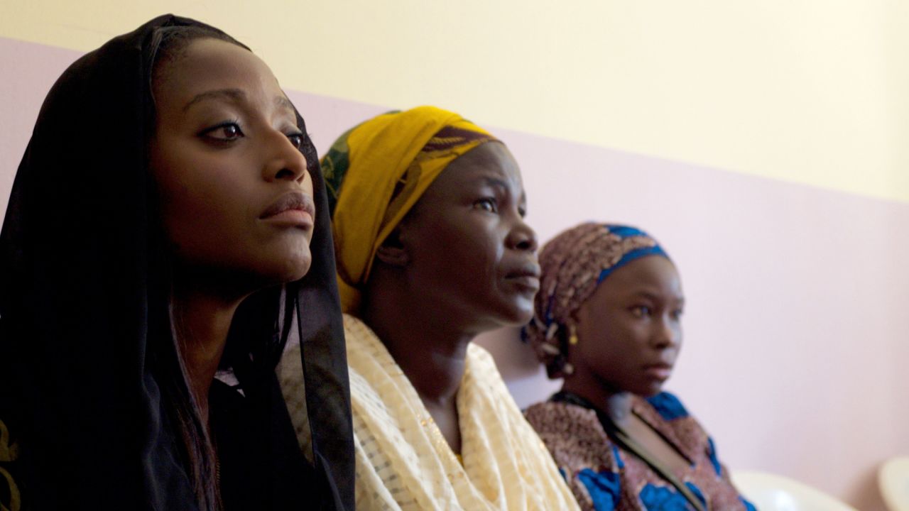 During the security briefing, CNN's Isha Sesay sits next to a mother of girl who has yet to be released by Boko Haram.  Close to 200 girls are still unaccounted for. 