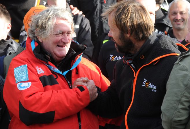 Coville was congratulated by veteran French skipper Olivier de Kersauson (left) who was a pioneer in multihull racing and twice held the Jules Verne Trophy for setting the fastest time around the world in sailboats of any kind with unrestricted crew size.