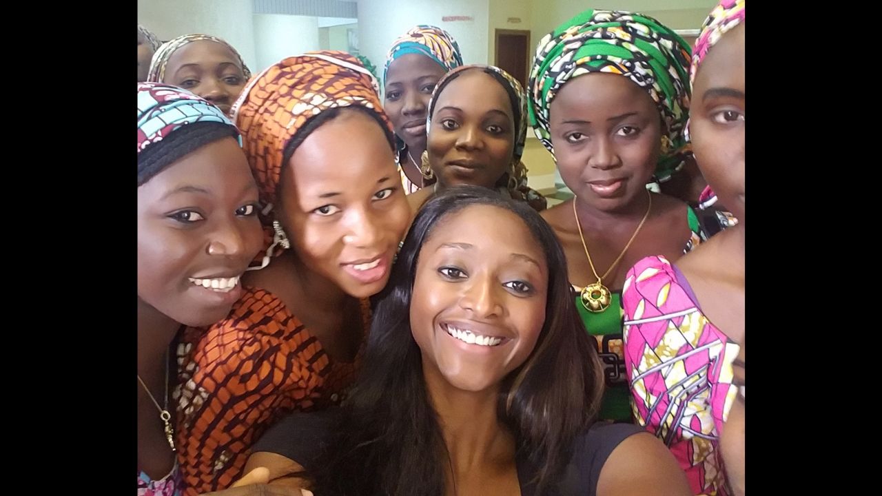 CNN's Isha Sesay takes a selfie with some of the freed Chibok girls. 