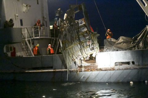 Wreckage from the Tu-154 plane is hauled from the Black Sea late on Monday, December 26.