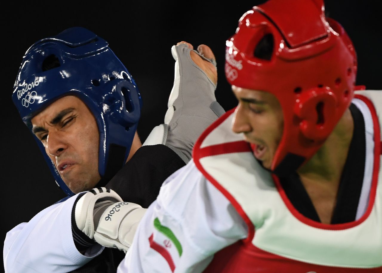 It was his first appearance at the Olympics, having failed to qualify on two previous occasions. Taufatofua lost his preliminary bout against Iran's Sajjad Mardani (R) in the +80 kg category.