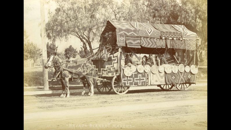 A photograph marked as "Navajo Blanket Makers" shows Native Americans riding aboard a wagon at the 1903 parade.