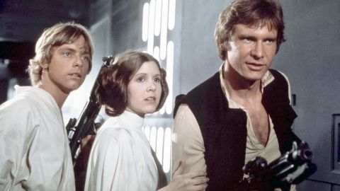 American actors Mark Hamill, Carrie Fisher and Harrison Ford on the set of Star Wars: Episode IV - A New Hope written, directed and produced by Georges Lucas. (Photo by Sunset Boulevard/Corbis via Getty Images)