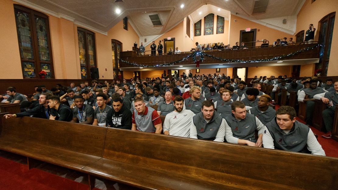 The players sit in the pews of the historic Ebenezer Baptist Church.