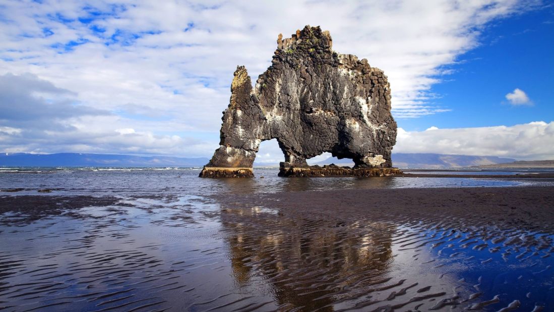 Just off the shore of Vatnsnes peninsula in northwest Iceland stands Hvítserkur, a 15-meter-high monolith that local legend claims is a petrified troll.