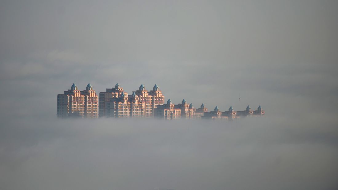 Advection fog, which forms when stable, warm and moist air is blown across a cooler surface, appears in Xingtai City, China.