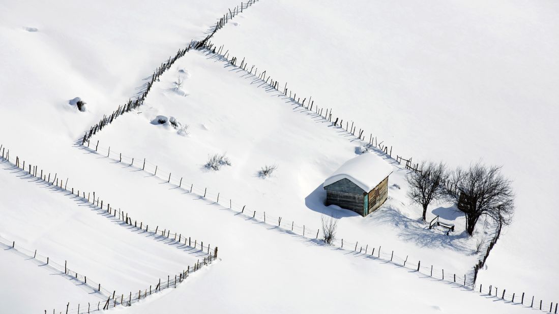 Snow covers wooden cottages in Iran's Talesh mountains, close to the Caspian Sea and some 262 miles (430 kilometers) northeast of Tehran. Villagers leave the cottages during the winter due to the snowfall, coming back in late spring.