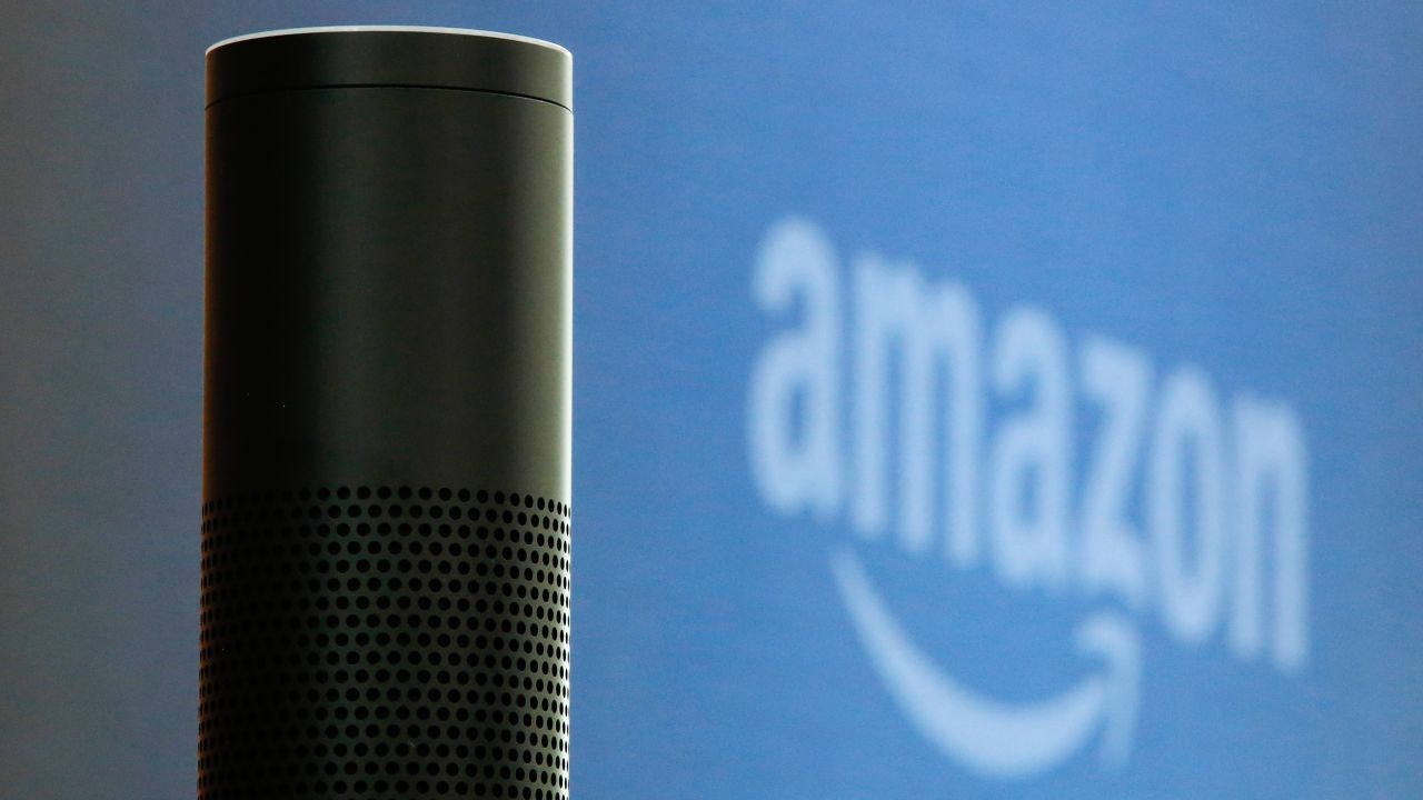 An "Echo" device stands on display during the U.K. launch event for the Amazon.com Inc. Echo voice-controlled home assistant speaker in London, U.K., on Wednesday, Sept. 14, 2016. The Seattle-based company today announced that its Echo product line will be available in the U.K. and Germany starting in the fall, the first time the gadget will be available outside the U.S. Photographer: Luke MacGregor/Bloomberg via Getty Images