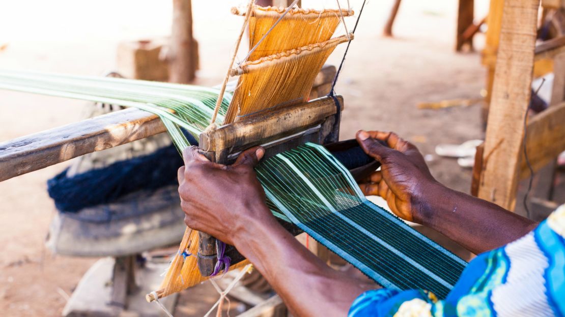 The hand woven wool fabrics are made on foot pedaled looms.