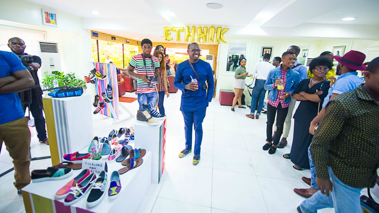 Founder Tunde Owolabi, pictured center, hopes to put his creations on the international runways in 2017.