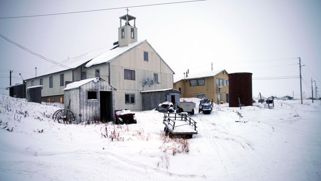 The local church is one of the main landmarks in town. There are only a couple of trucks on the island. Most people travel on foot or snowmobile.