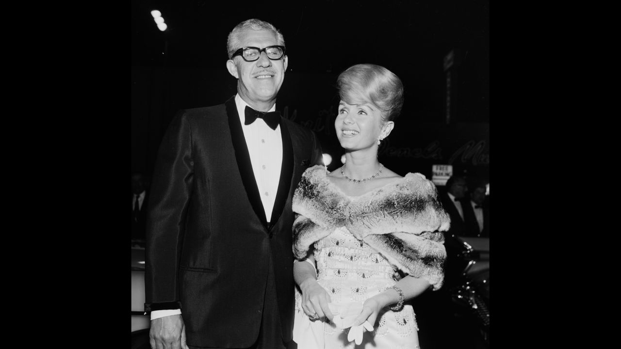 Reynolds and Harry Karl attend an event in Los Angeles in 1962.