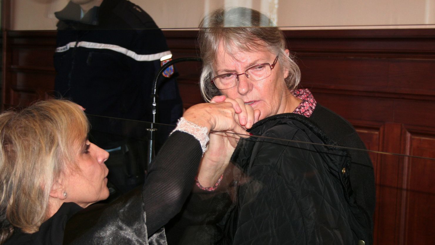 Jacqueline Sauvage is seen with her lawyer during her trial in Blois, France, in December. 