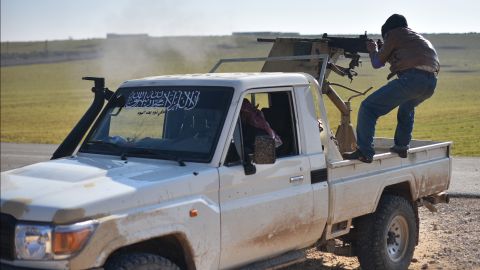 Members of the Free Syrian Army attack ISIS positions in Aleppo province on December 11.