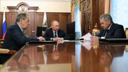 Russian President Vladimir Putin speaks with Defence Minister Sergei Shoigu and Foreign Minister Sergei Lavrov during a meeting at the Kremlin in Moscow on December 29. Putin said on december 29, 2016 in televised comments that Damascus and the bulk of the armed opposition had signed a document on a ceasefire in Syria and also an announcement on their readiness to start peace negotiations. The truce deal will go into effect from midnight, Russia's Defence Minister Sergei Shoigu said, with the Syrian military announcing that it was gearing up to halt all operations.