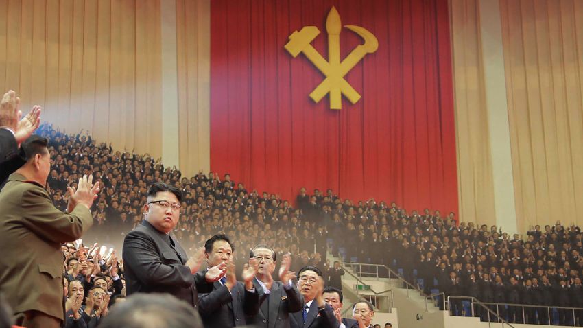 This photo taken on December 28, 2016 and released on December 29, 2016 by North Korea's official Korean Central News Agency shows North Korean leader Kim Jong-Un at a joint art performance by the Moranbong Band and the State Merited Chorus in honor of the participants in the First Conference of Chairpersons of the Primary Committees of the Workers' Party of Korea in Pyongyang. 