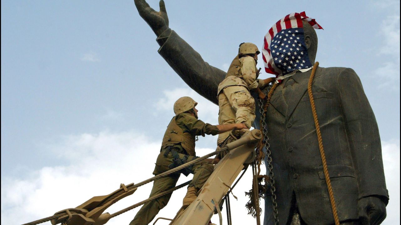 US troops topple a statue of Saddam Hussein on April 9, 2003, in Baghdad.