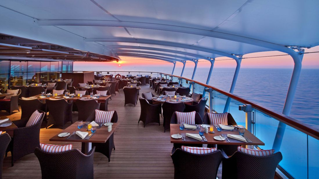 The Colonnade restaurant offers breakfast and lunch at indoor and outdoor tables aboard the Seabourn Encore.