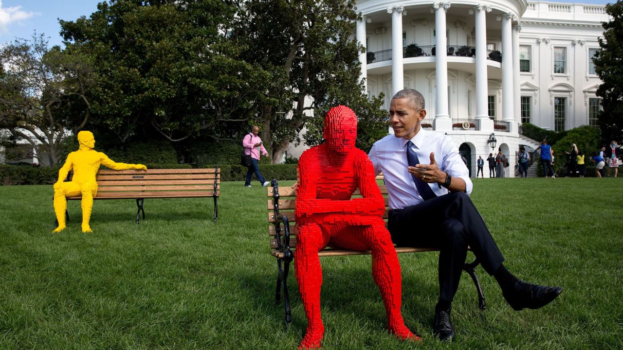 "The White House was hosting South by South Lawn, an event based on the infamous South by Southwest event in Austin, Texas. Just before lunch that day, the President was checking out the setup from a window in the Oval Office before the gates were opened. 'Hey Pete,' he said to me, 'let's go take a picture with the LEGO® men.' And so we did." (Official White House Photo by Pete Souza)