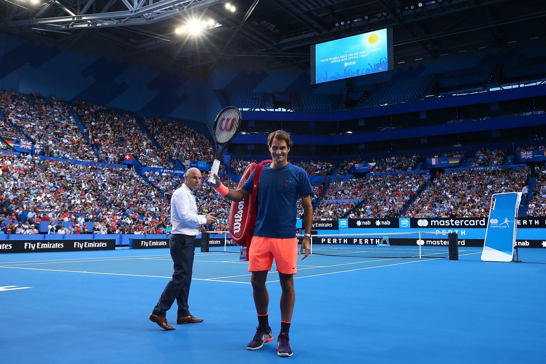 Federer acknowledges his fans at the 14,000-capacity Perth Arena on Thursday. 